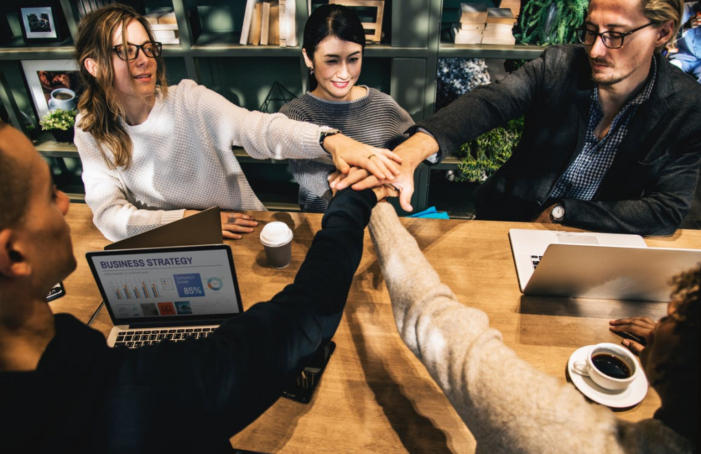 team-meeting-hands-in
