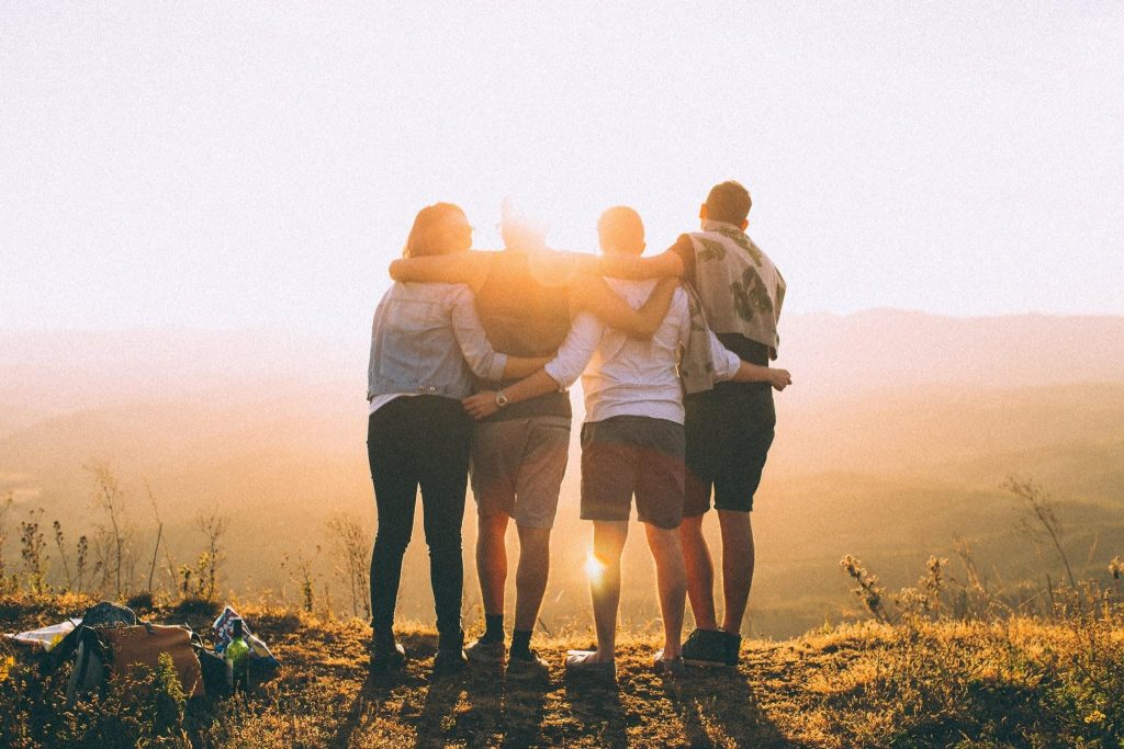 group-in-front-of-sunset