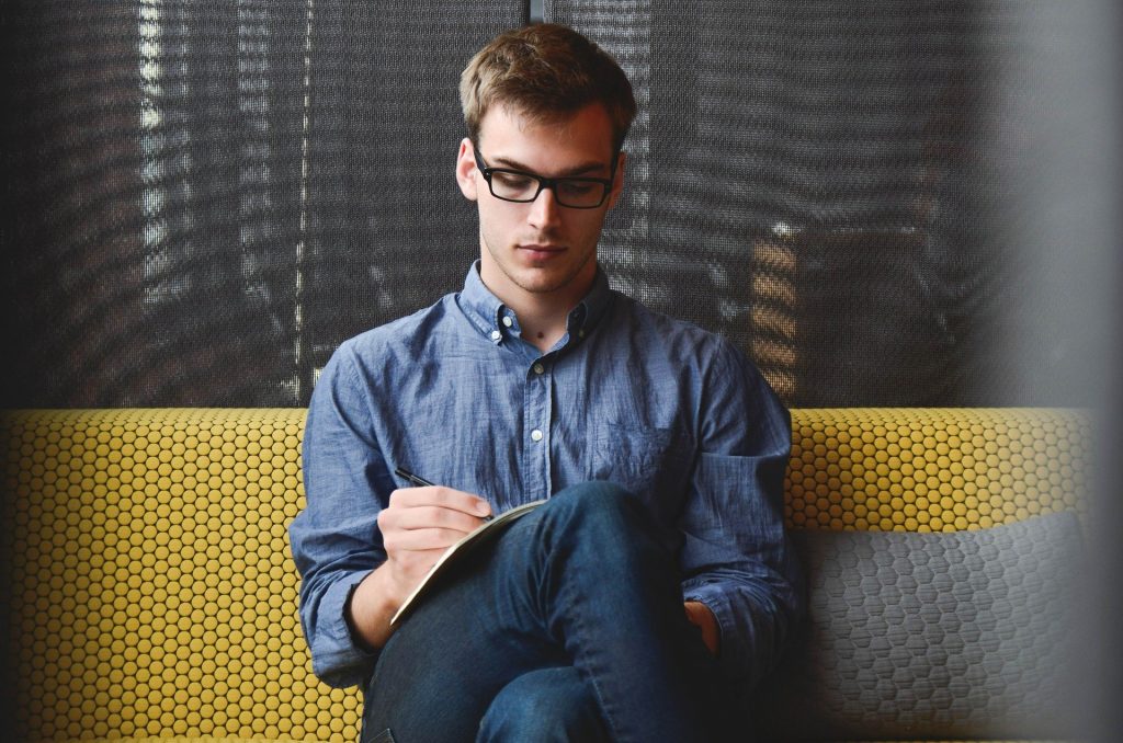 man-taking-notes