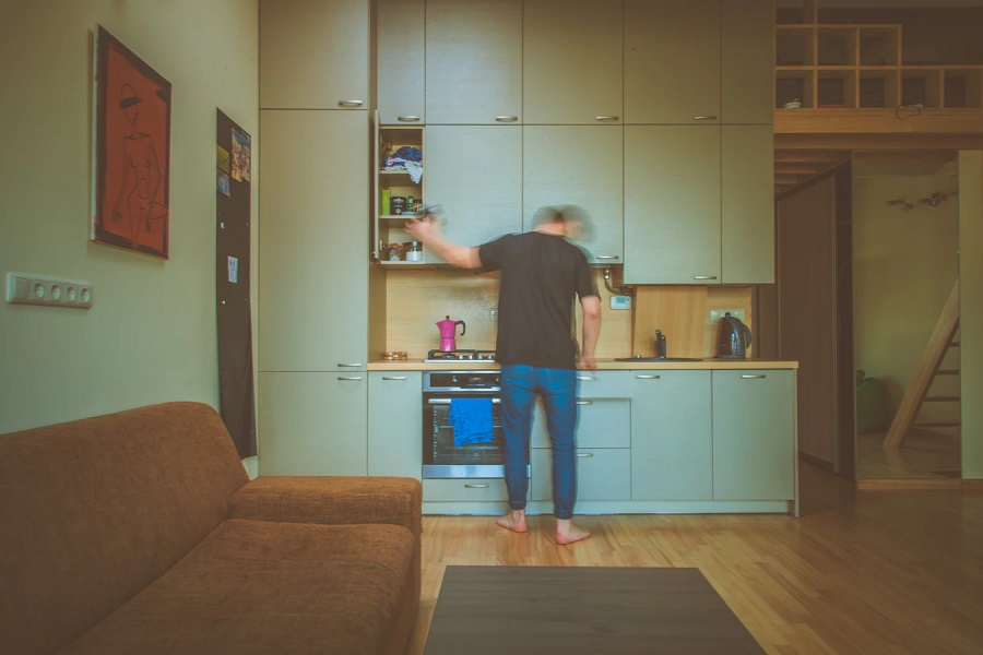 blurred man in his kitchen