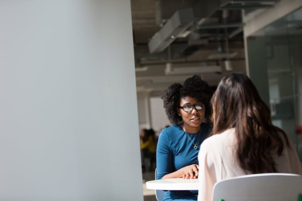 meeting-two women talking-discussion