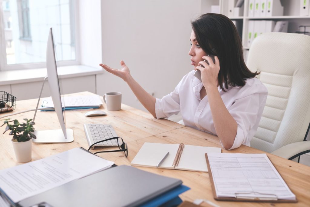 woman on phone-entrepreneur-working from home-meeting-discussion-office
