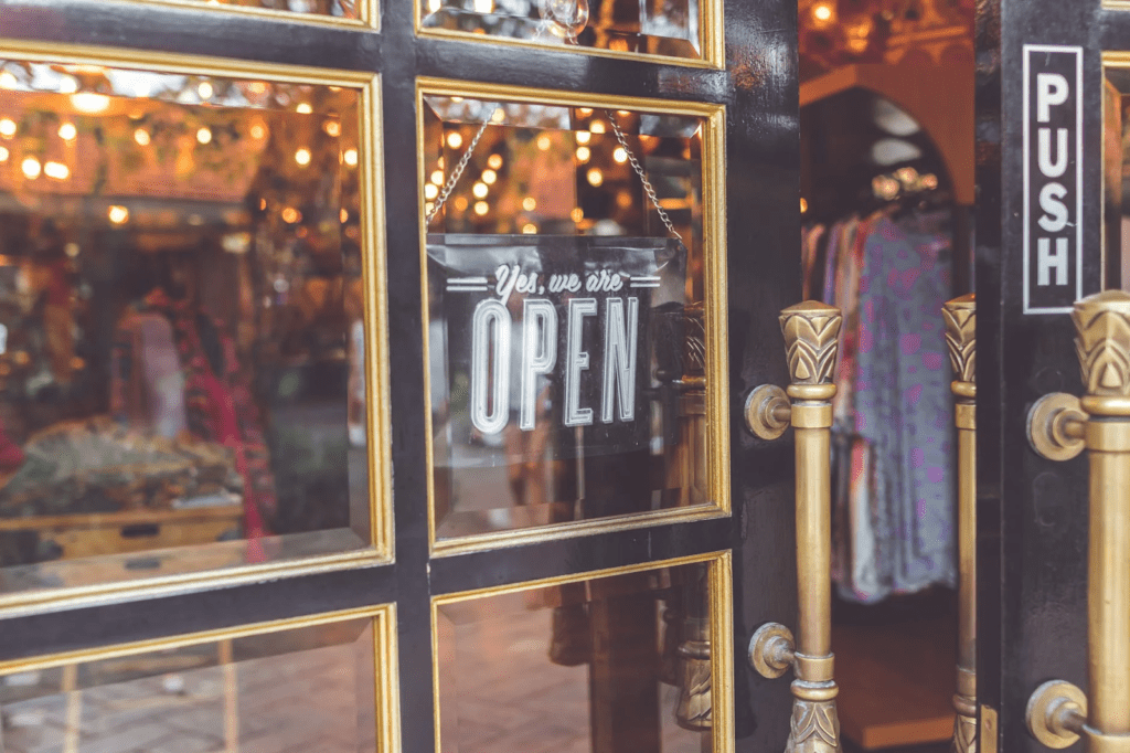 open sign-window storefront-commerce-store