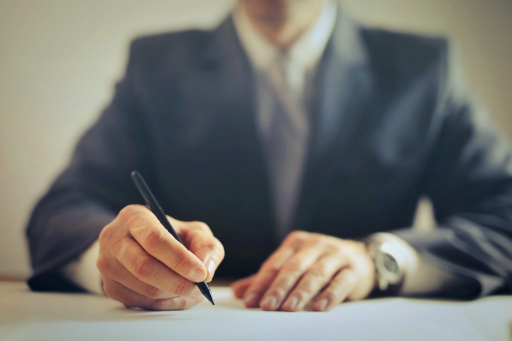 man writing-entrepreneur-business man