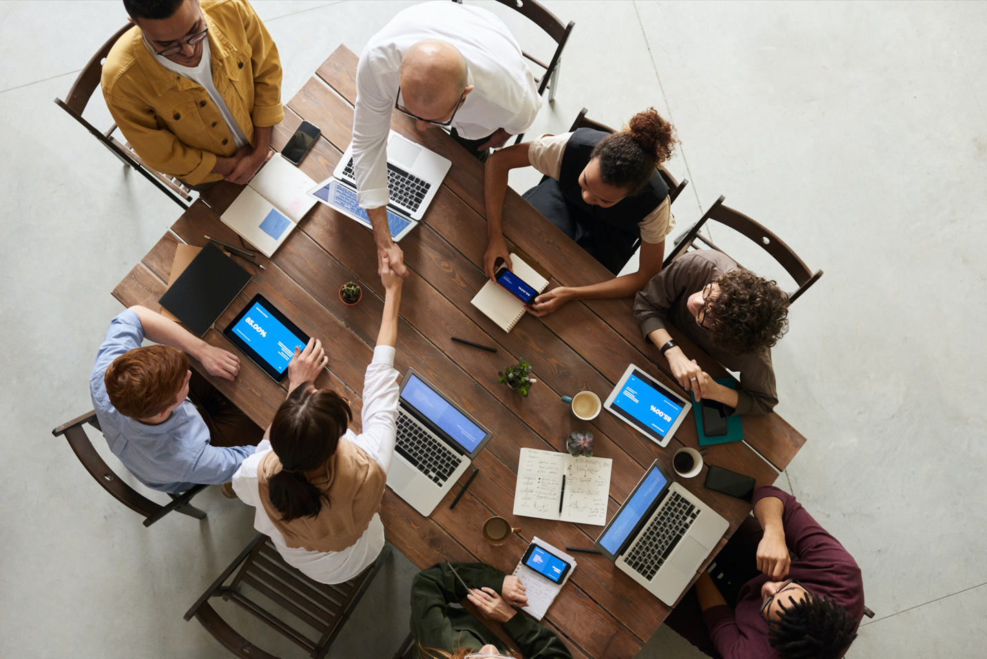 entrepreneurs and workers around a table