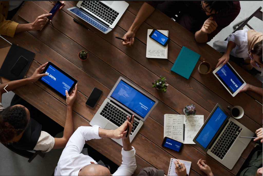 entrepreneurs - leaders working together with laptop