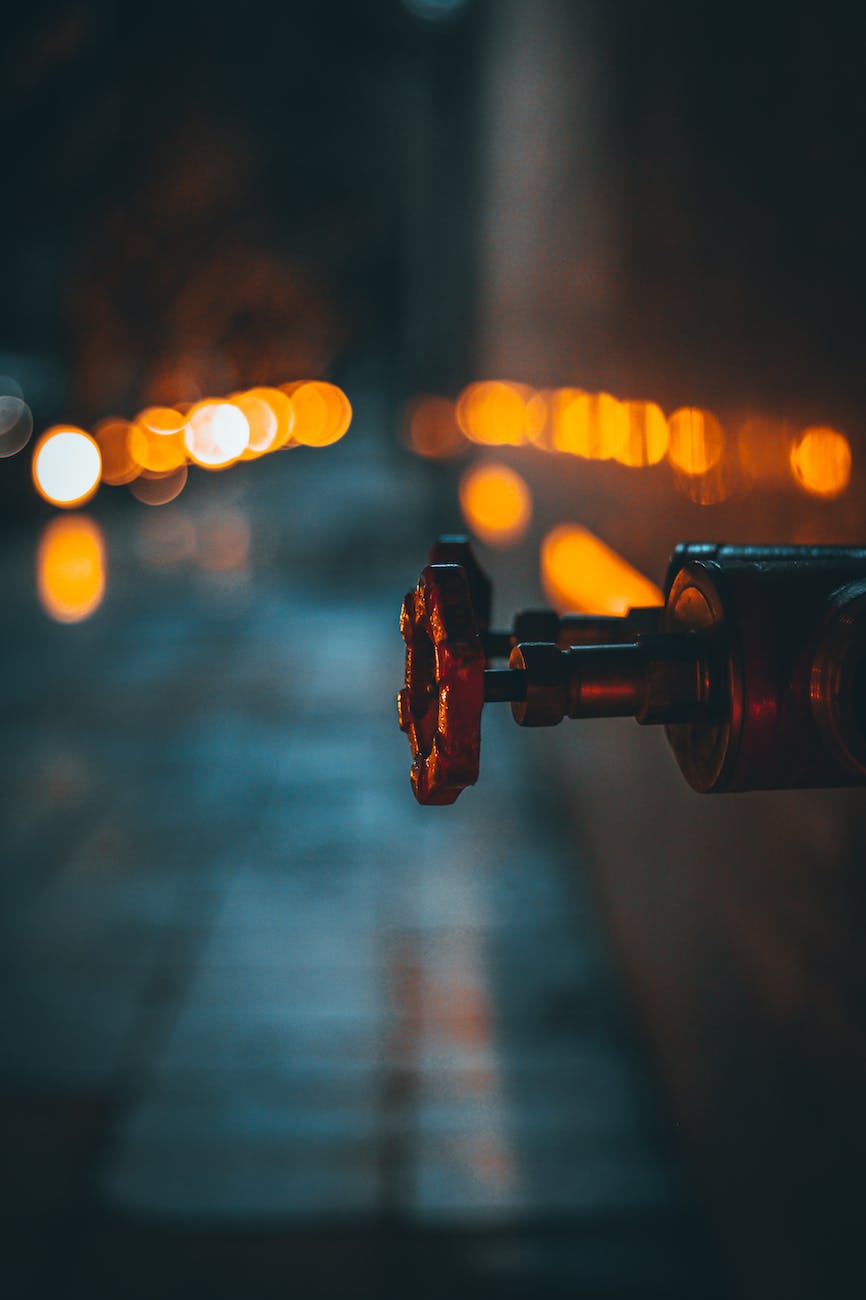 close up photo of a pipe with valve