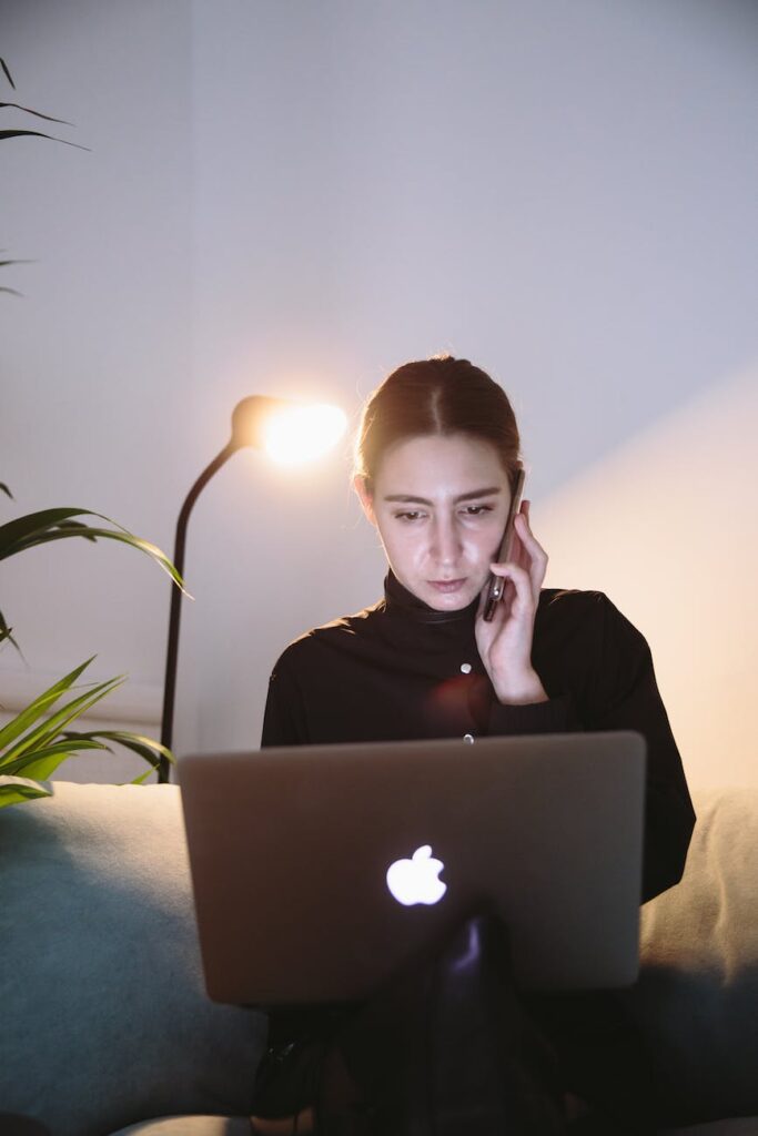 photo of woman using smartphone