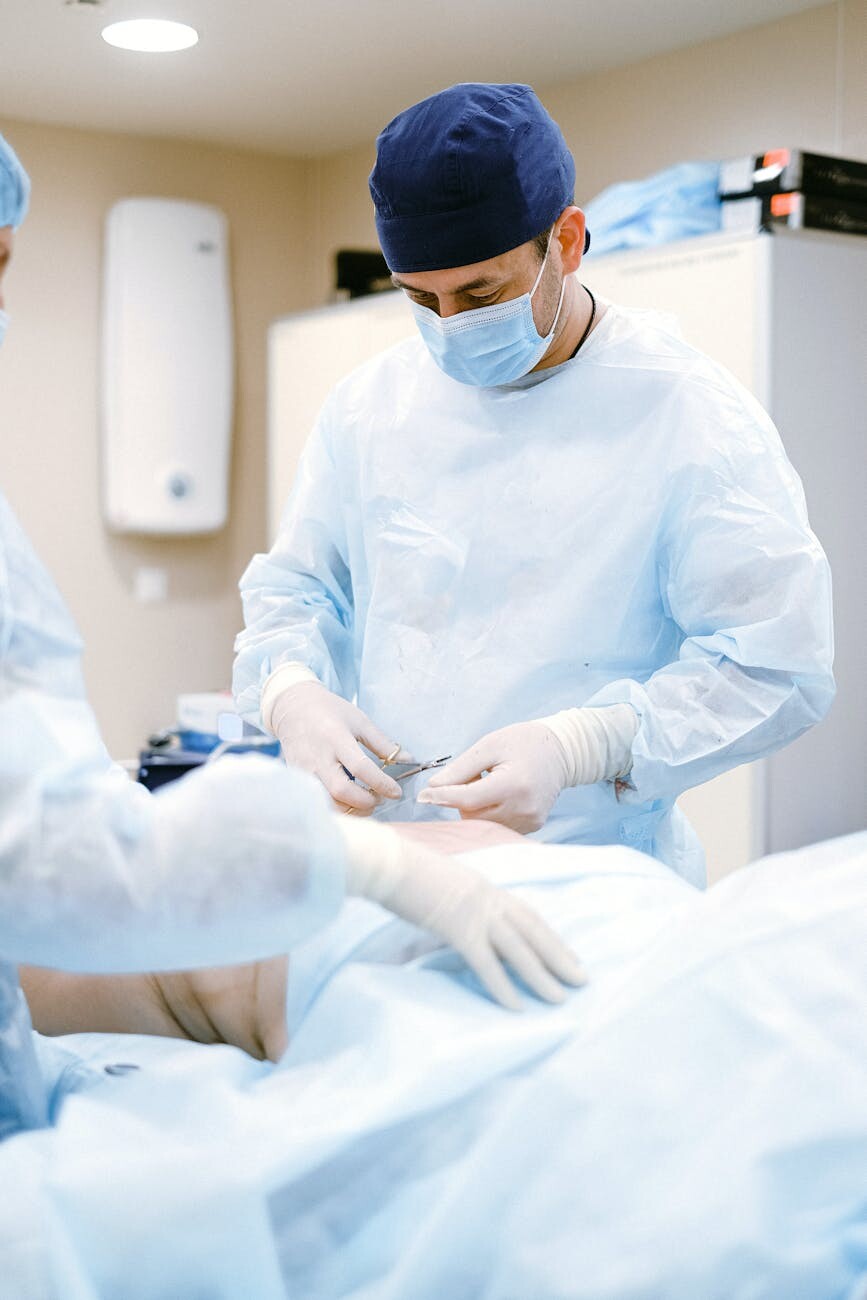 male doctor in blue scrub suit