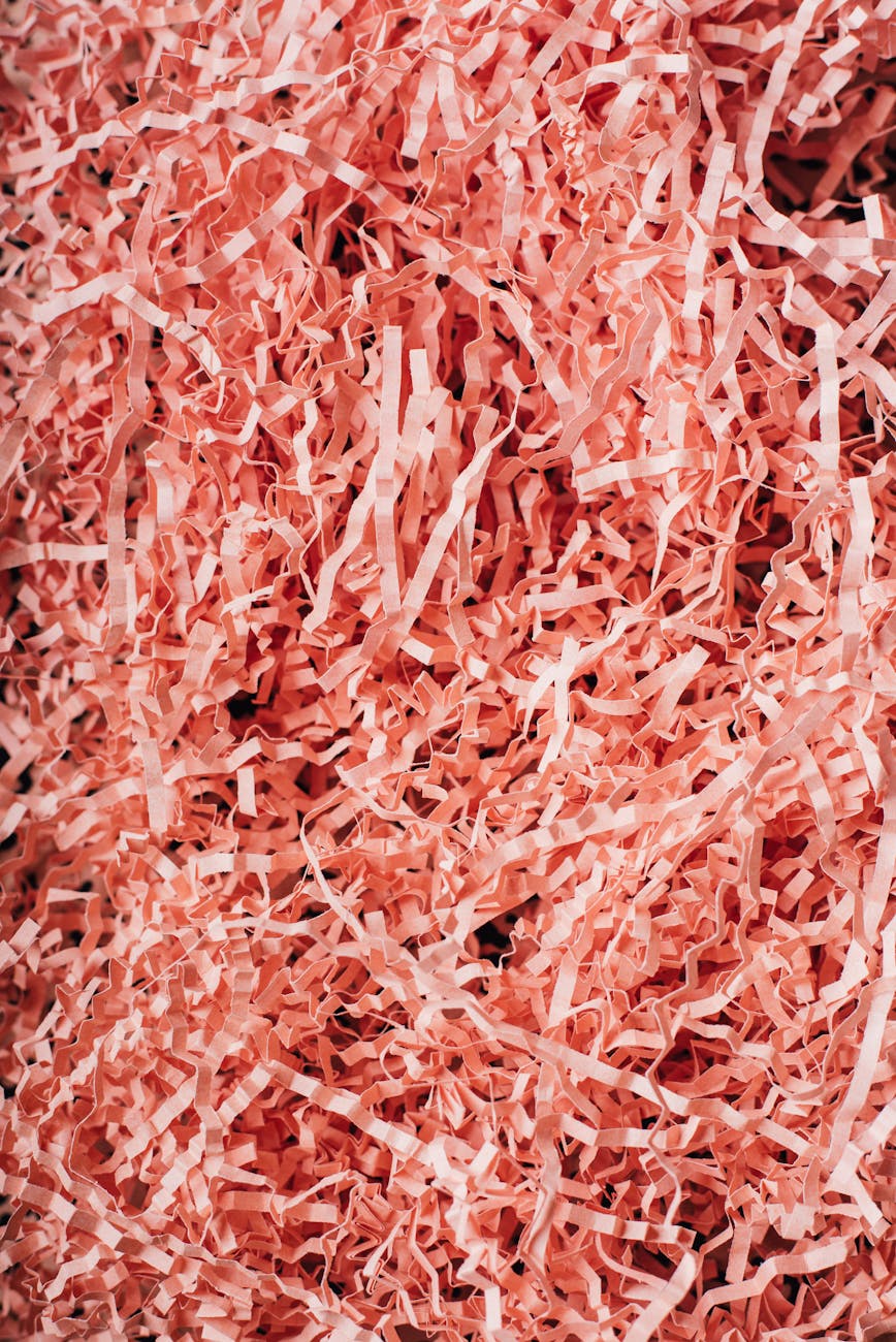 pile of gifting shredded paper as background