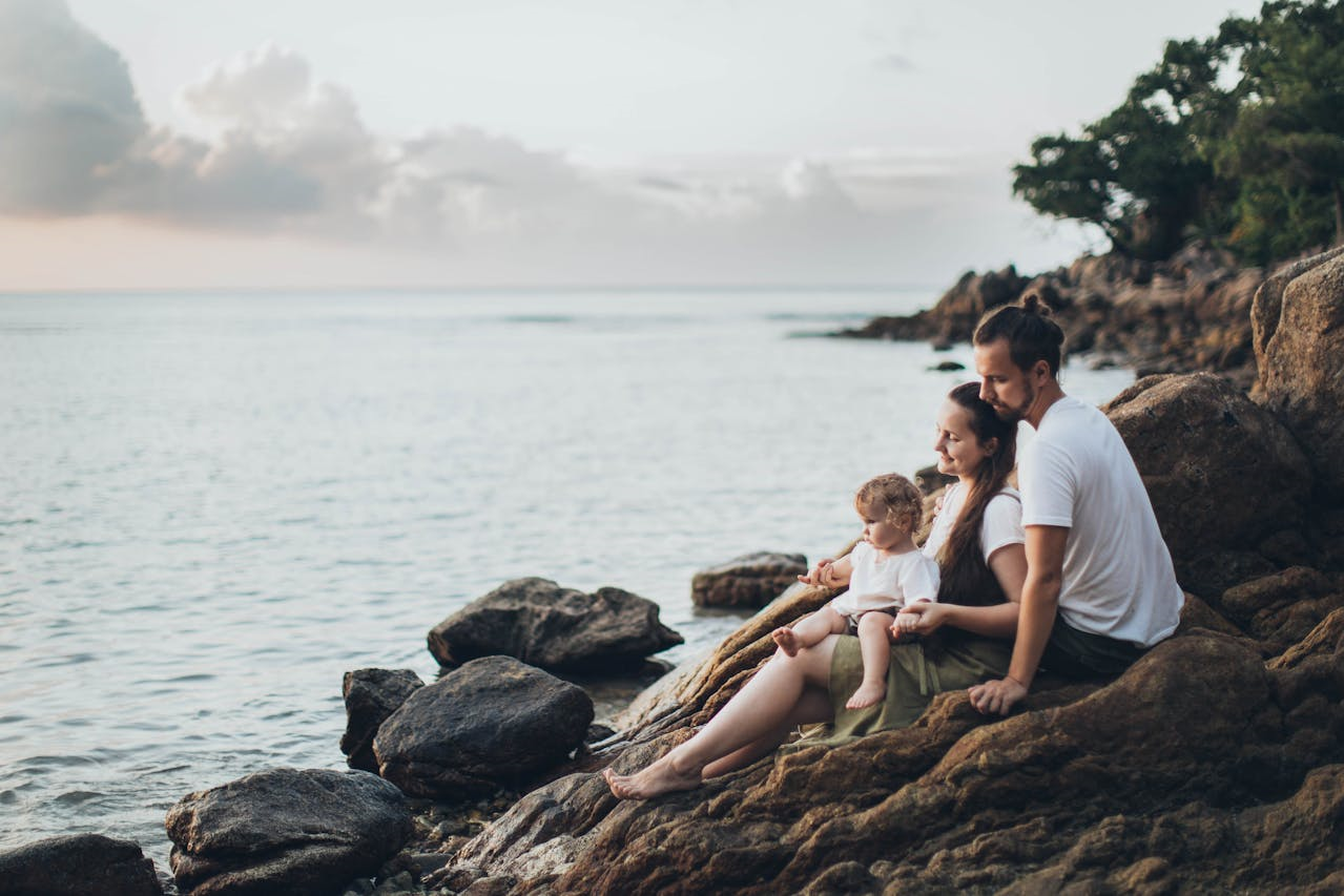 couple on rocks near beach