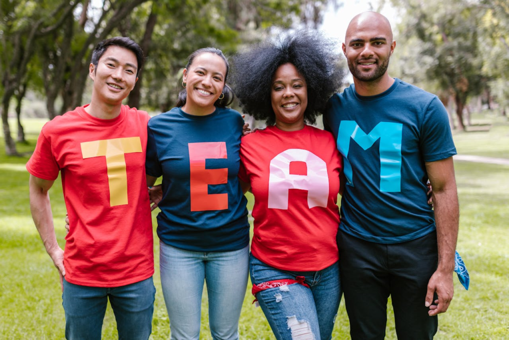 group of people wearing TEAM shirts