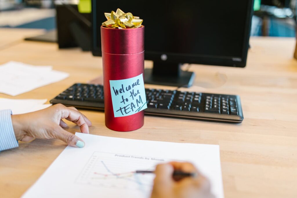 Gift on a table in front of a computer