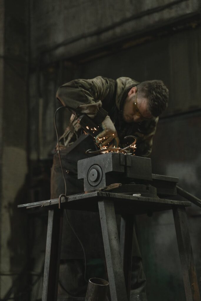 a man doing a metalwork