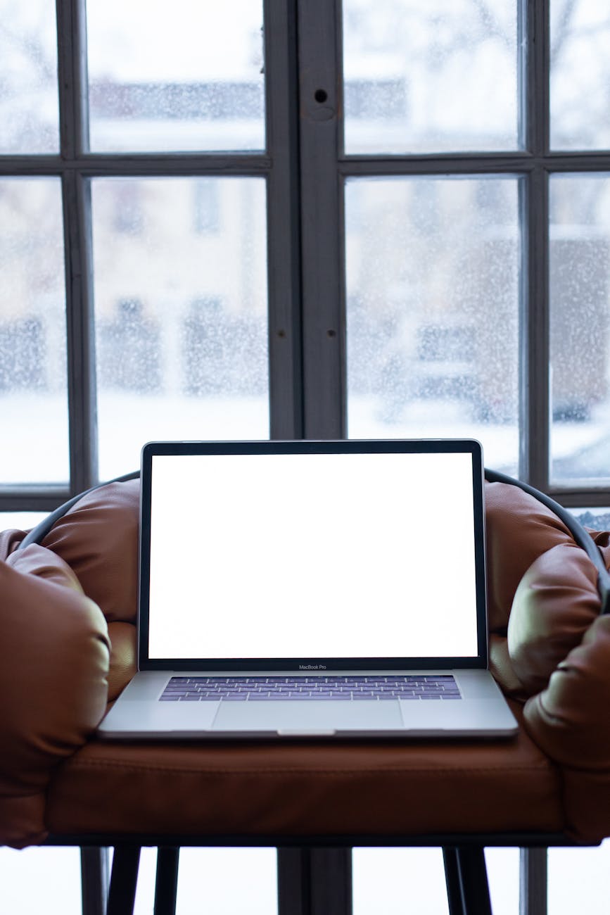 laptop displaying a blank white screen