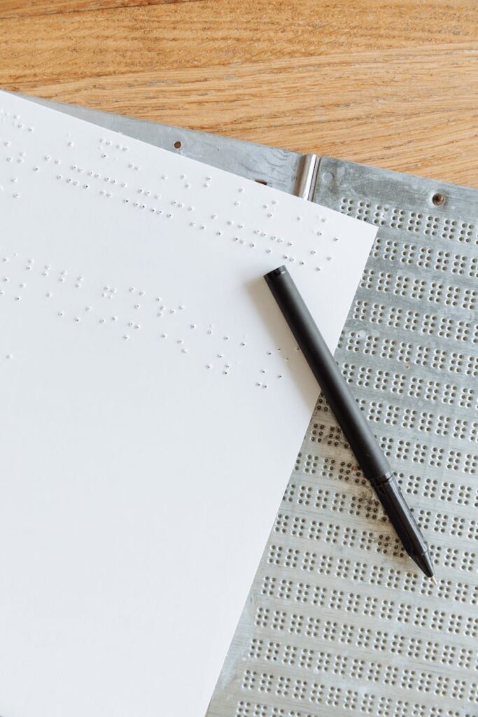 black pen on braille paper