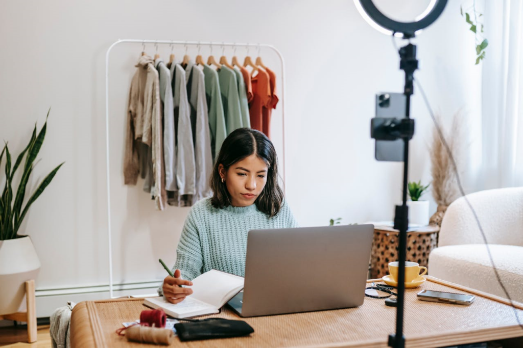 Focused blogger working on project at home