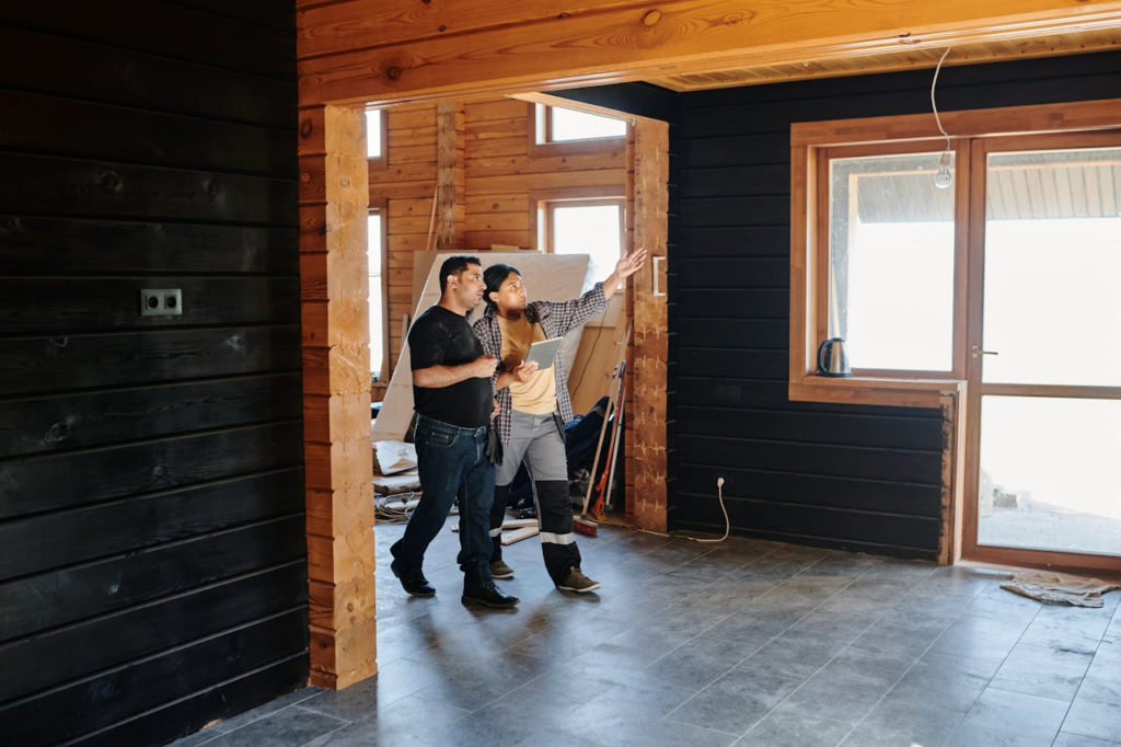 two people checking on a construction project