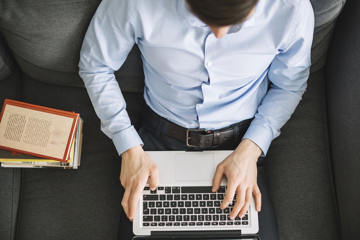 from-man-using-laptop-sofa