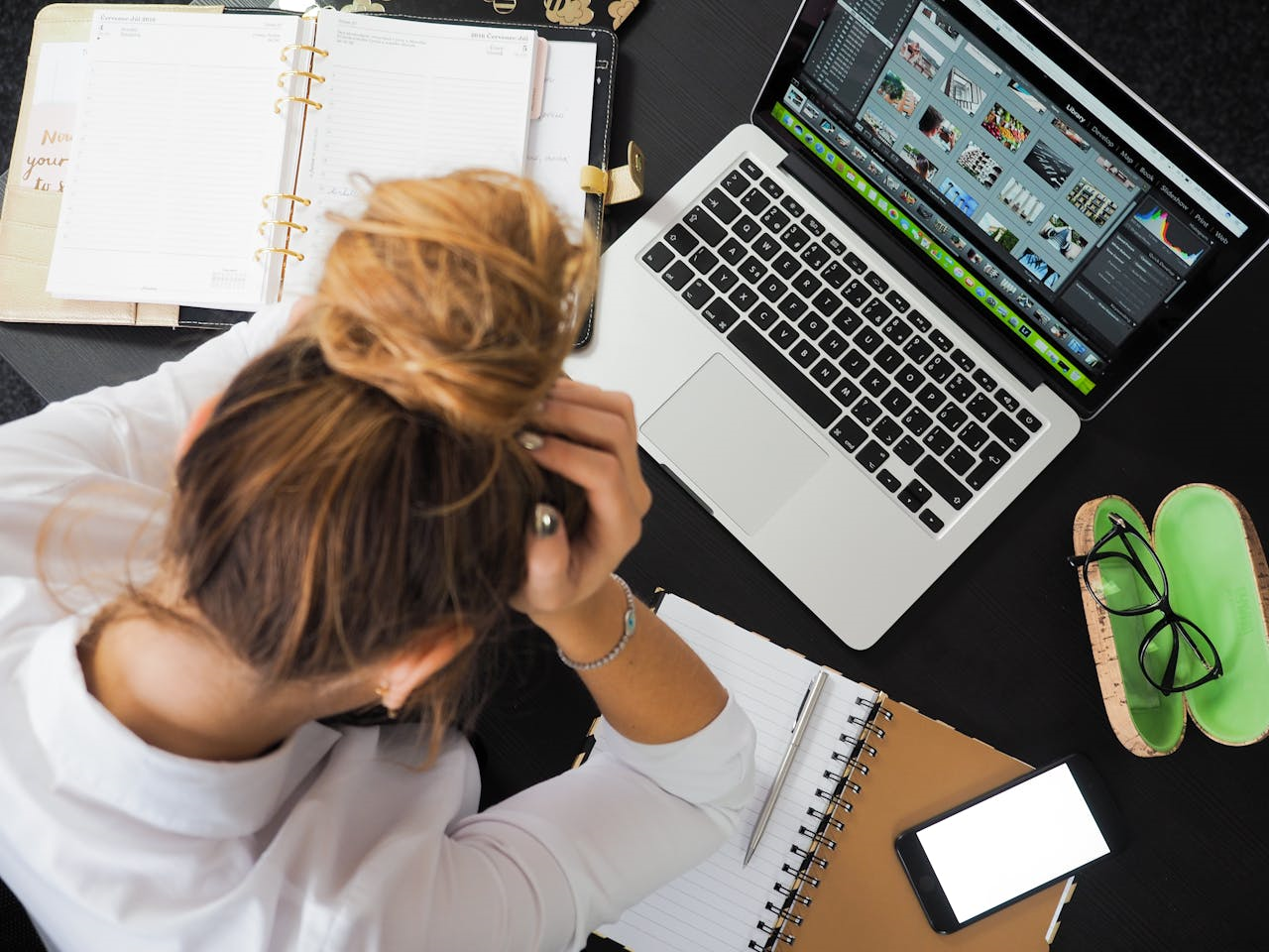 woman sitting in front of computer