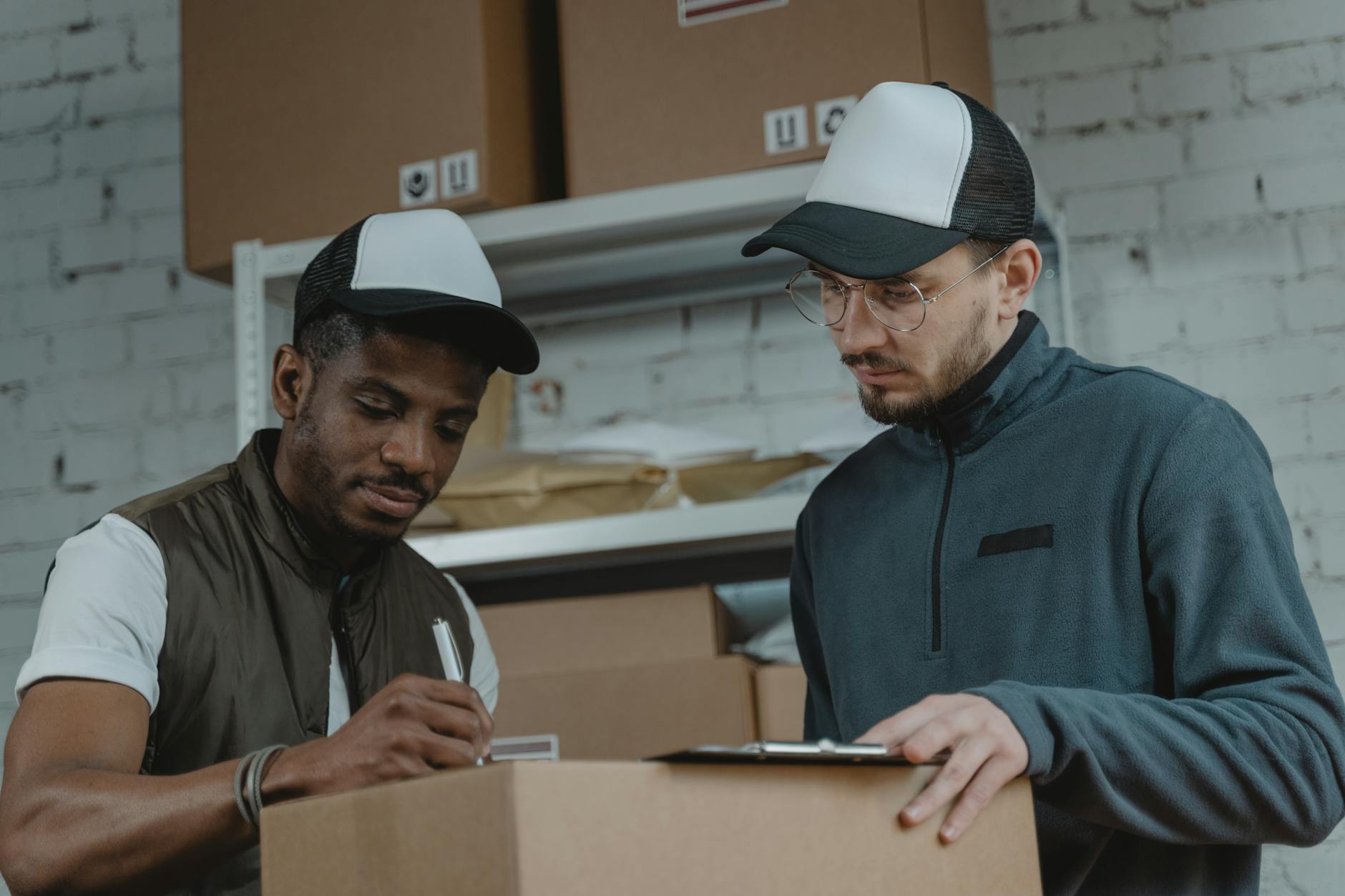 two employees looking at a document