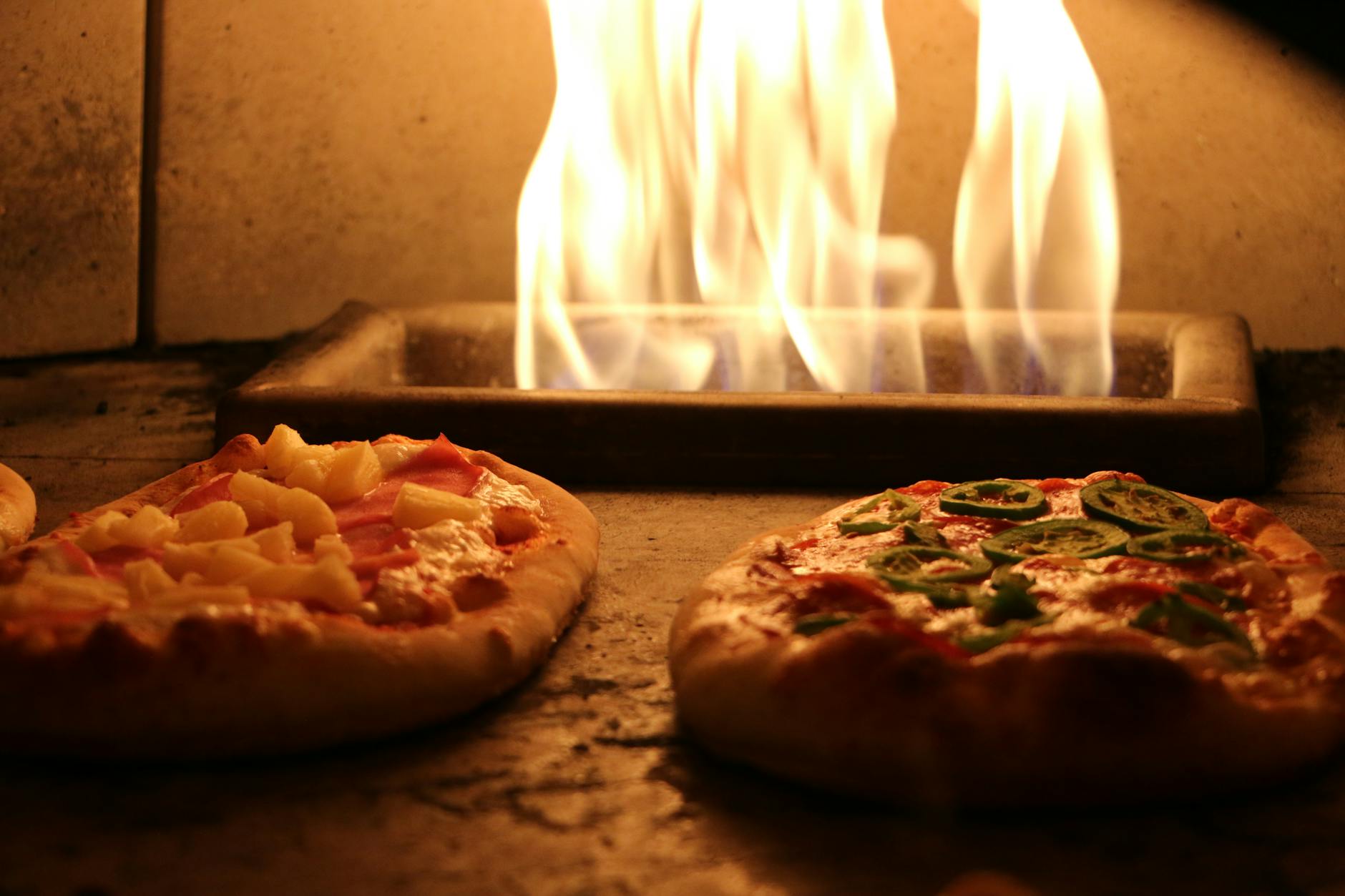 two pizza in stove