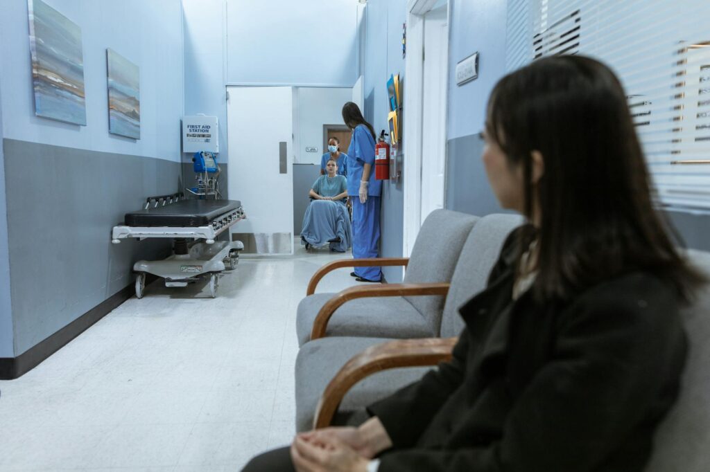 nurse pushing a patient on a wheelchair