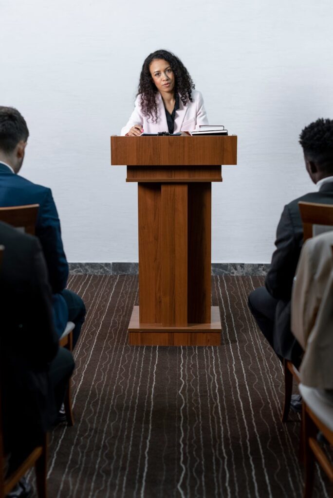 a woman standing on the podium