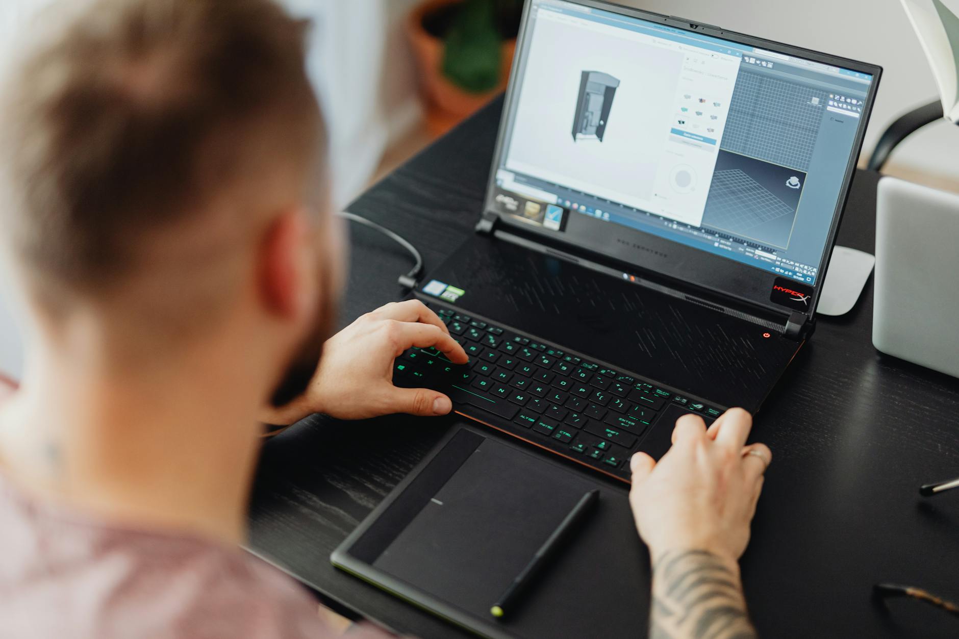 a man using laptop