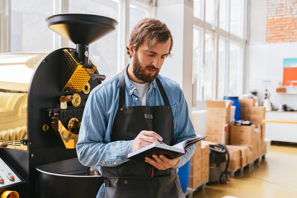 man holding a notebook