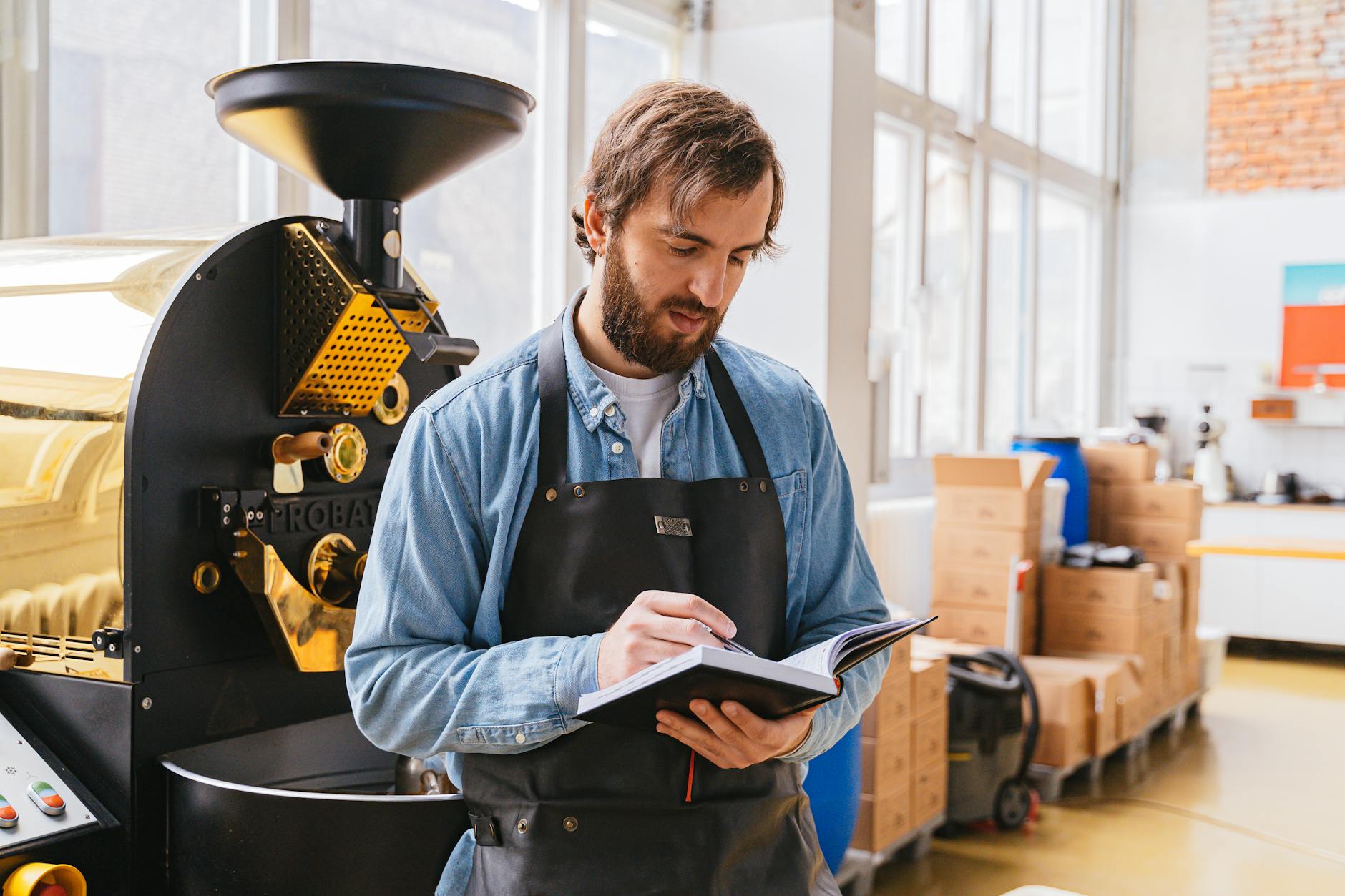 man holding a notebook