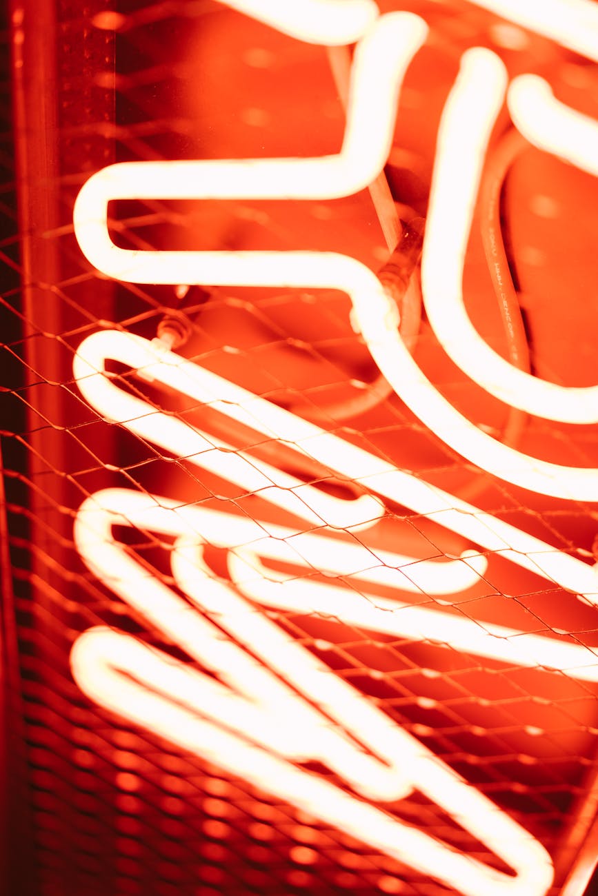 close up shot of a red neon signage