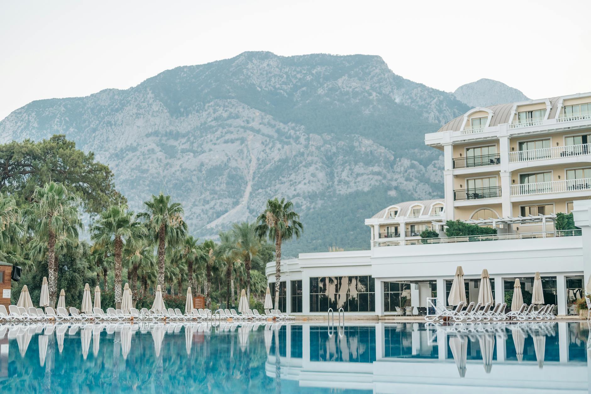 resort with a swimming pool with mountain view