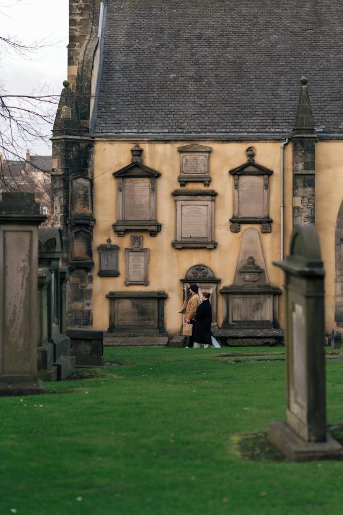 historic cemetery in edinburgh with church and gravestones