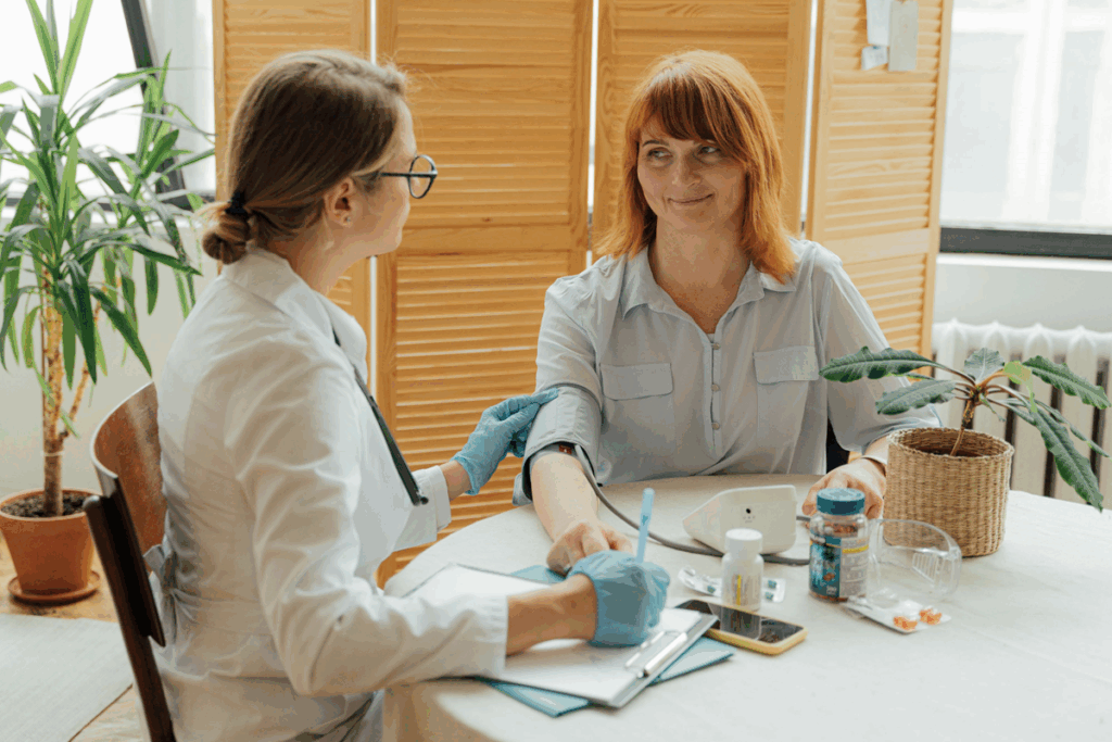 A Doctor Checking a Patients Blood Pressure