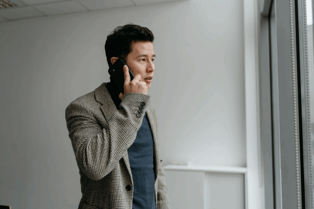A Businessman on a Phone Call - Lead Grow Develop - Business, Technology, Personal Development man on a phone call