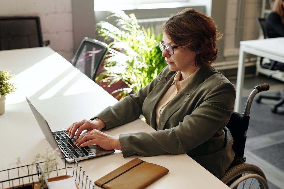 image - Lead Grow Develop - Business, Technology, Personal Development business womand typing on laptop