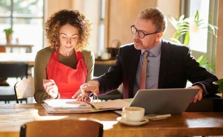 image - Lead Grow Develop - Business, Technology, Personal Development restaurant looking at books