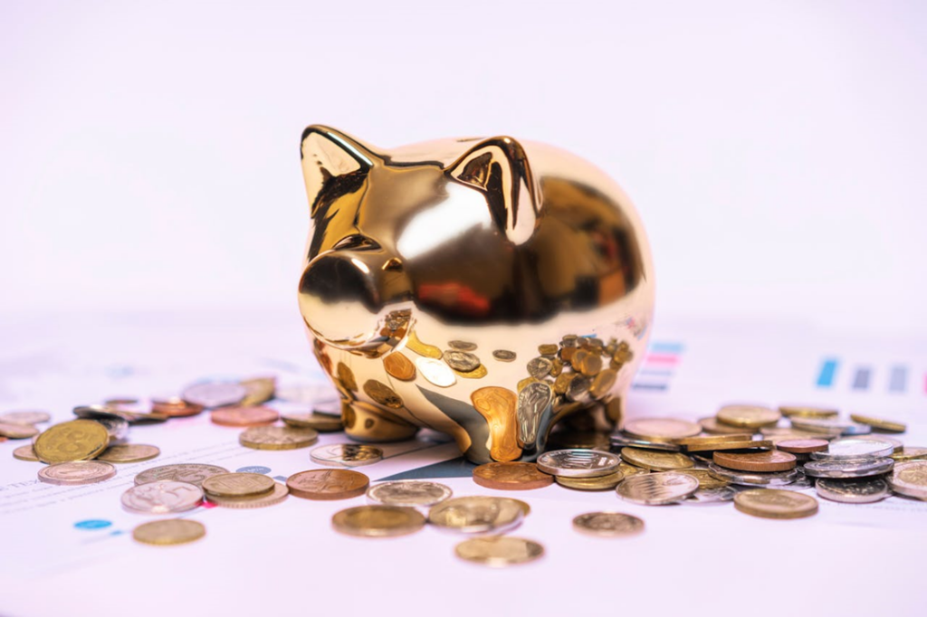 Retirement Planning Strategies for a More Predictable Future - Lead Grow Develop - Business, Technology, Personal Development Golden piggy bank for retirement planning