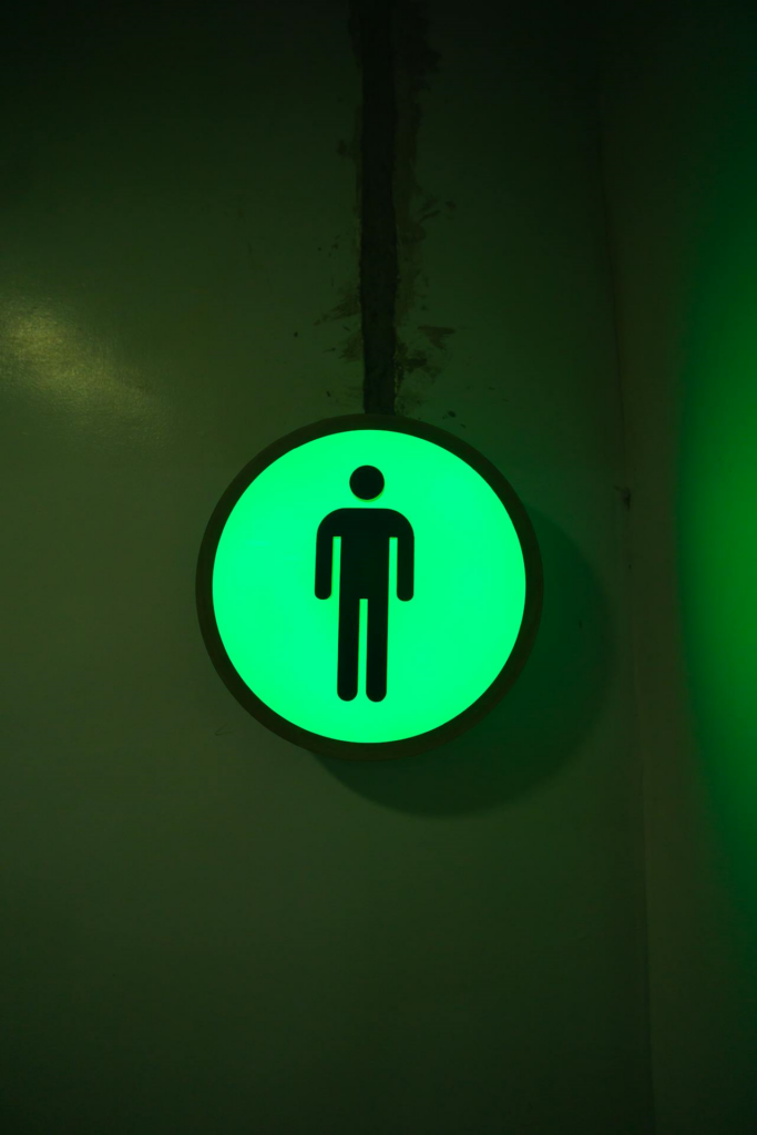 Green Illuminated Male Restroom Sign