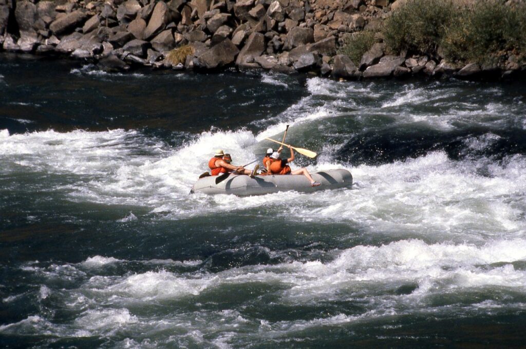 Thrilling whitewater rafting on a scenic Oregon river, perfect for adventure seekers and nature lovers