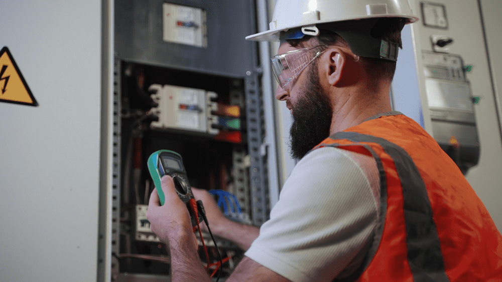 electrician working on panels