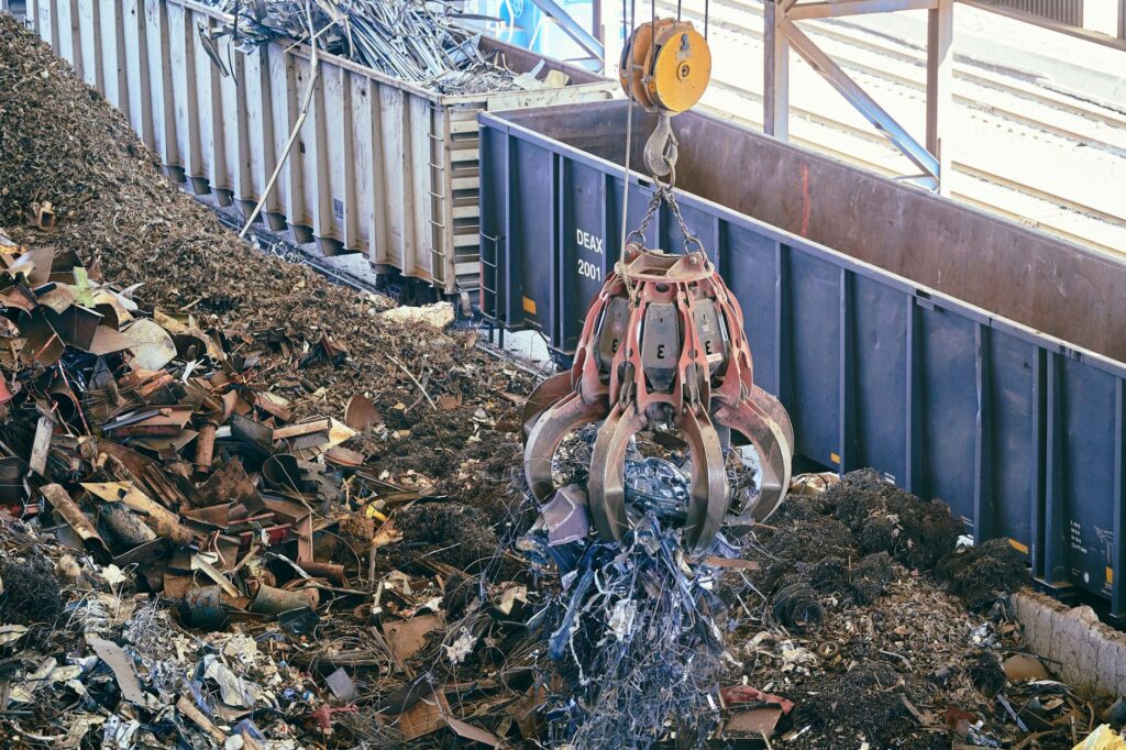industrial scrap metal recycling with claw crane