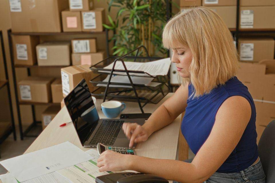 woman looking at laptop