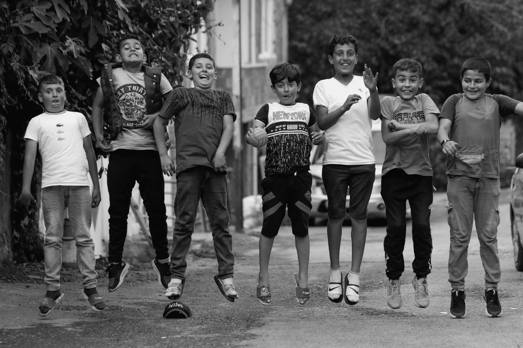 children jumping up and down